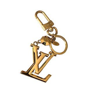 Louis Vuitton, Porte Cles LV Initial Key ring can be converted to a necklace1153